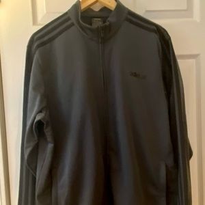 Adidas track jacket, never worn.  Mens large